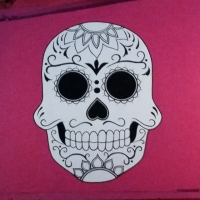 The giant skull looking over the patio.